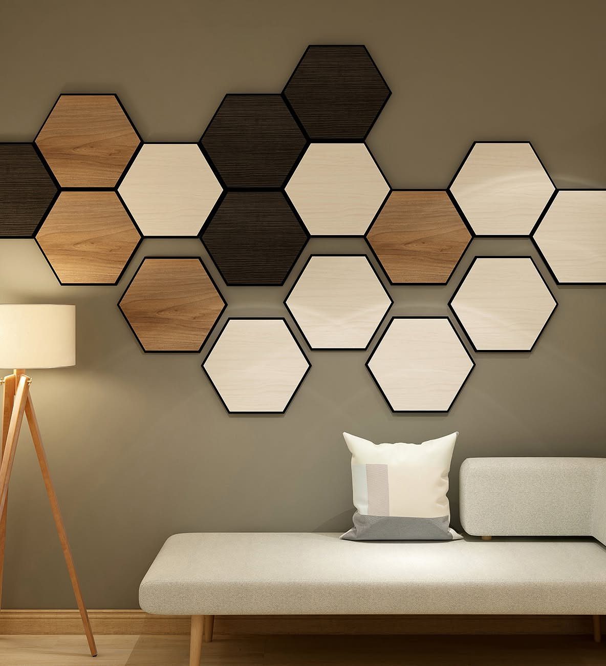 Hexagonal wood panels in various shades arranged geometrically on a grey interior wall.