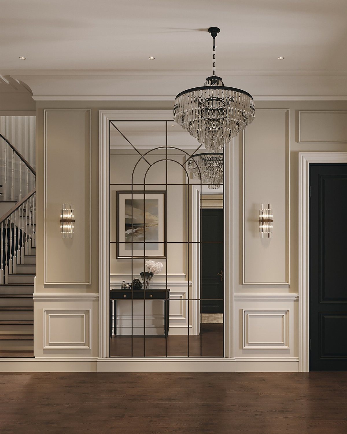 Cream wainscoting and decorative wall molding in a luxury entryway with an arched mirror and chandelier.